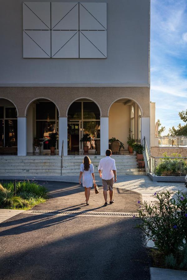Akrotiri Beach Resort Hotel Paleokastritsa Exterior foto The main entrance of the University of Patras